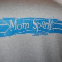 The customized "Mom Spark" blanket that Sweatshirt Blanket made for me.