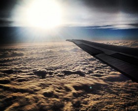 Plane in the Clouds Photo momspark.net