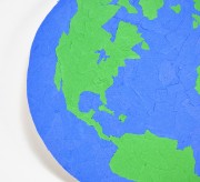 For Earth Day dust off those construction paper scraps and make a recycled Earth. It's perfect to hang on a wall and fun decoration!