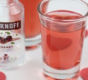 Pink cherry vodka shooters that are perfect for Valentine's Day night.