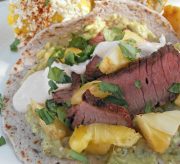 Carne Asada Taco Recipe for Cinco de Mayo! While this Cinco de Mayo recipe may seem long and fussy, it is very simple to put together. To save time you can prepare a few components ahead of time. The combination of spicy peppers, grilled pineapple, and Carne Asada is downright delicious.