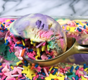 Rainbow Unicorn Ice Cream Recipe - Unicorns may be imaginary magical creatures, but we're still ready to celebrate them. Today's recipe does just that. It's a mixture of bright rainbow ice cream colors covered in sprinkles. This ice cream recipe is perfect for your next fantasy unicorn party celebration. Or just because it's fun and delicious. Either way. No judgment here.