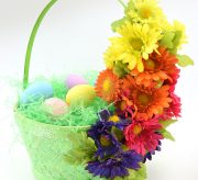 Easily embellish cheap Easter baskets with glitter, flowers and ribbons. So cute and inexpensive!
