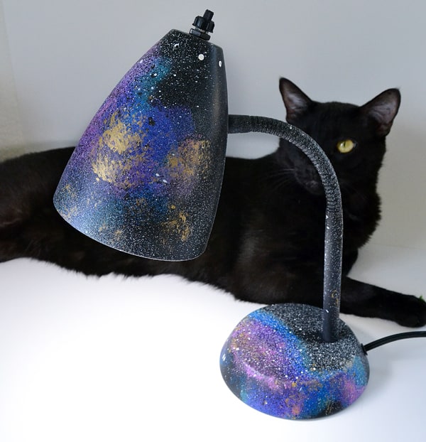 The galaxy trend is still going strong! This DIY painted Galaxy Desk Lamp is easy and inexpensive. A great way to pep up any desk!