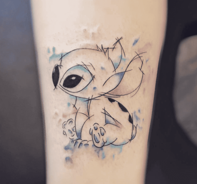 Watercolor Stitch tattoo for the Disney lover in all of us
